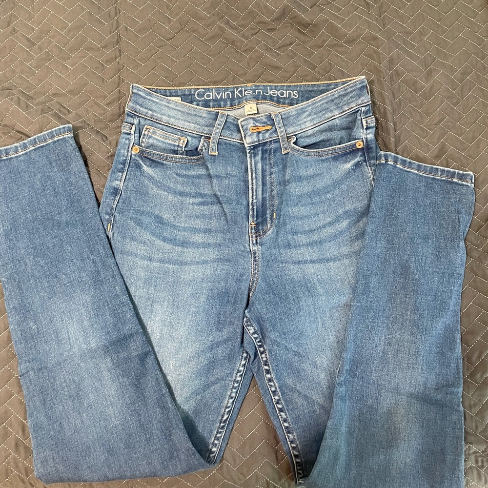 Size 4 jeans. Like new; worn 2-3 times only. Clean.